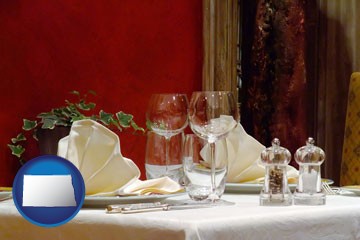 a French restaurant table setting - with North Dakota icon