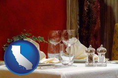california map icon and a French restaurant table setting
