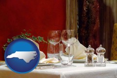 north-carolina map icon and a French restaurant table setting
