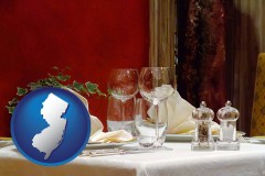 new-jersey map icon and a French restaurant table setting