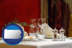 pennsylvania map icon and a French restaurant table setting